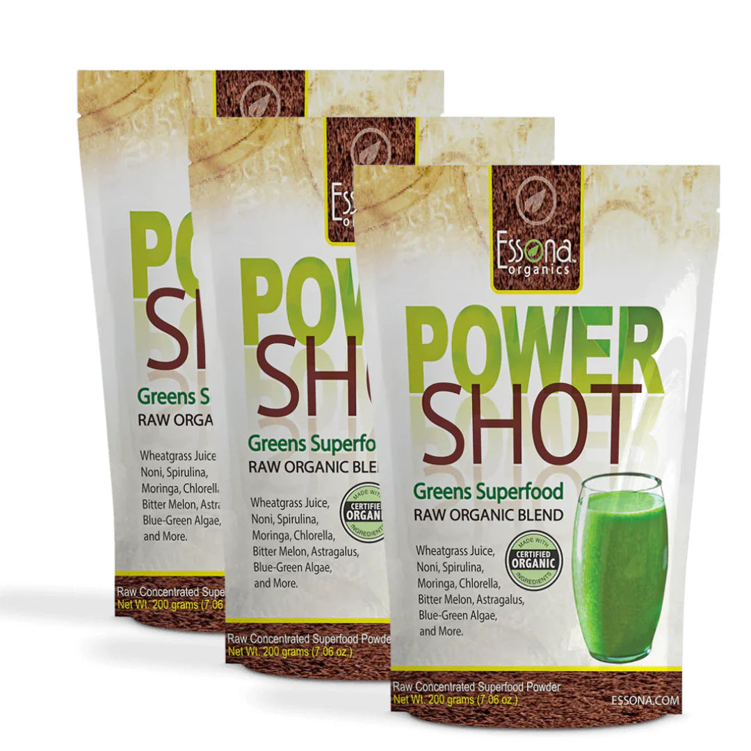 3 packages of Essona Organics Power Shot Greens Superfood, featuring a glass of green smoothie and a list of organic ingredients like spirulina, chlorella, wheatgrass, and more.