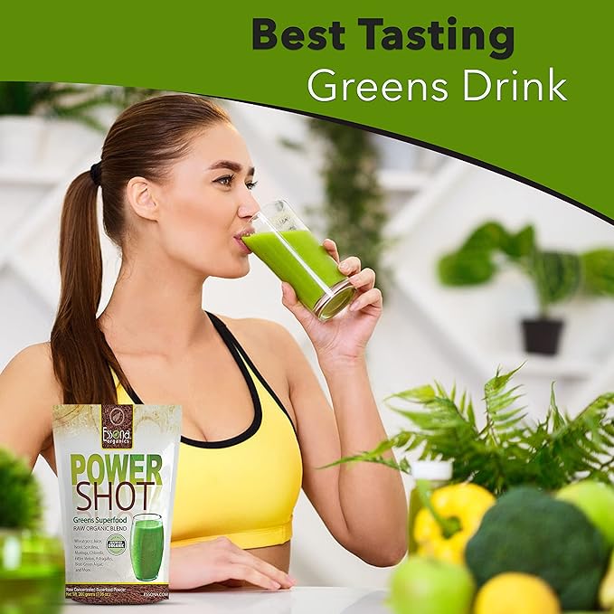A woman drinking a green smoothie, with the product's packaging 'Power Shot Greens Drink' visible in the foreground.