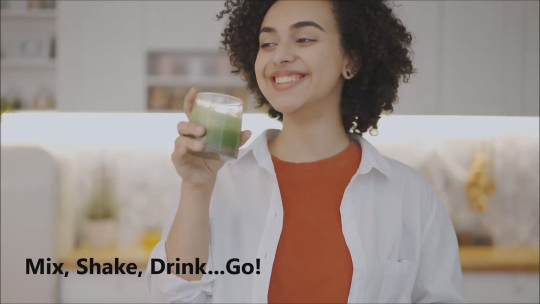 Woman enjoying green smoothie